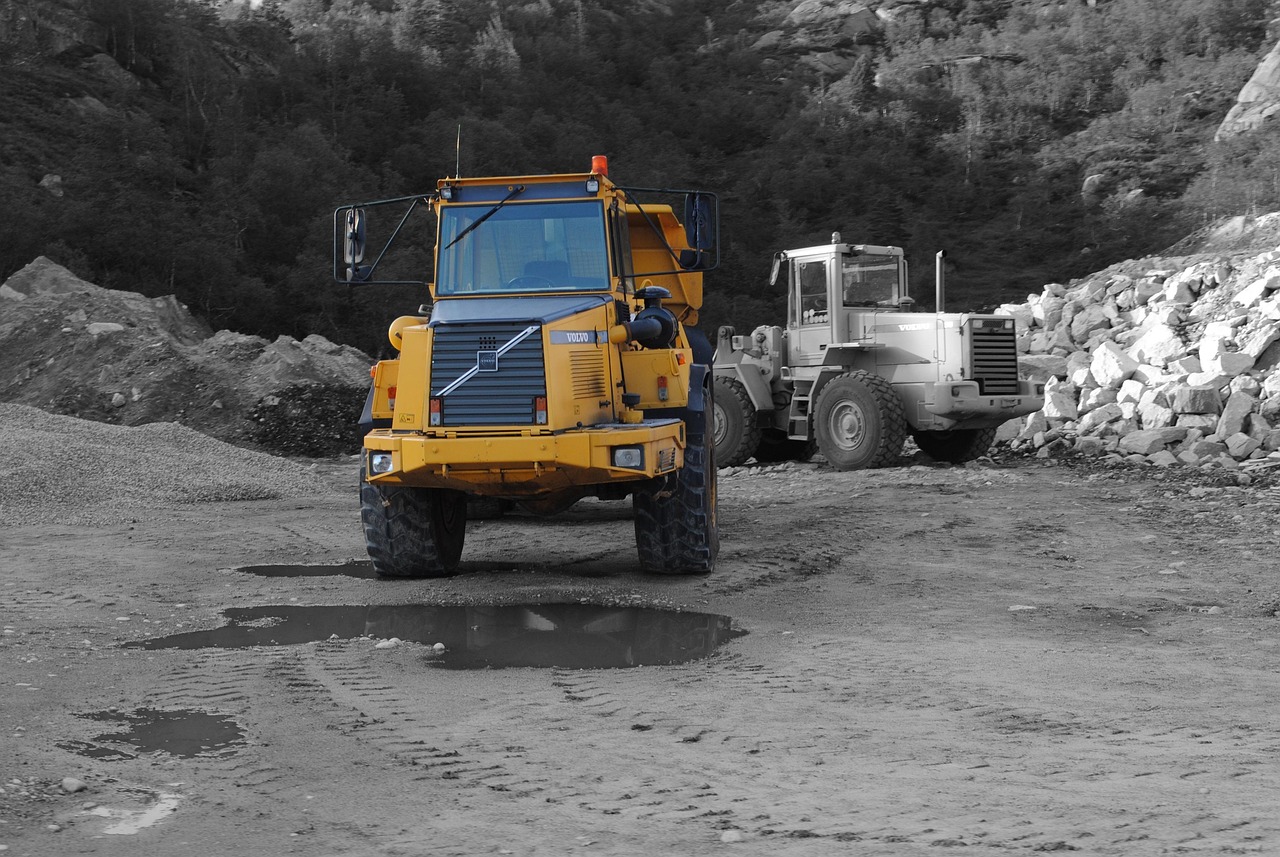 Excavator working a rocky Bozeman lot